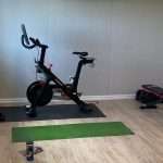 A small home gym in a finished basement in New Jersey.